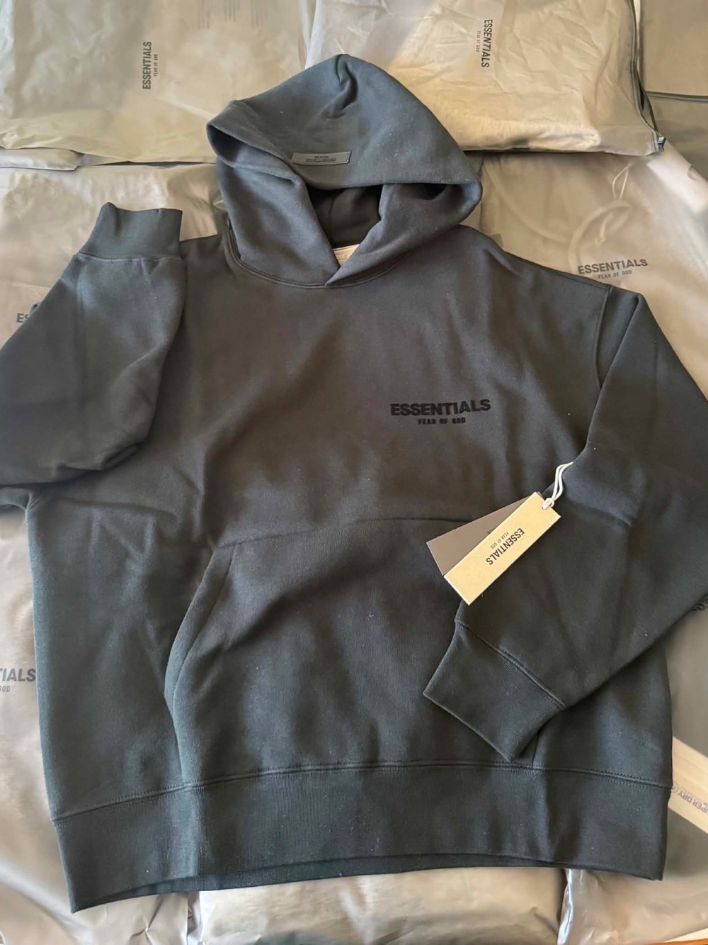 Essentials Black Pullover Hoodie with Chest Logo